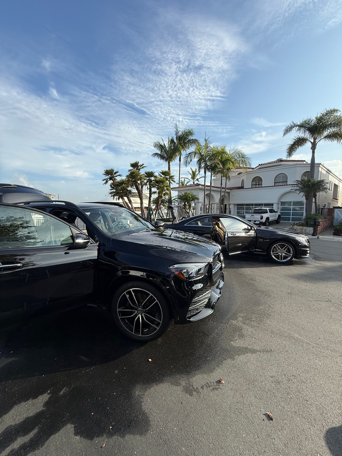 Client vehicles detailed at a private residence