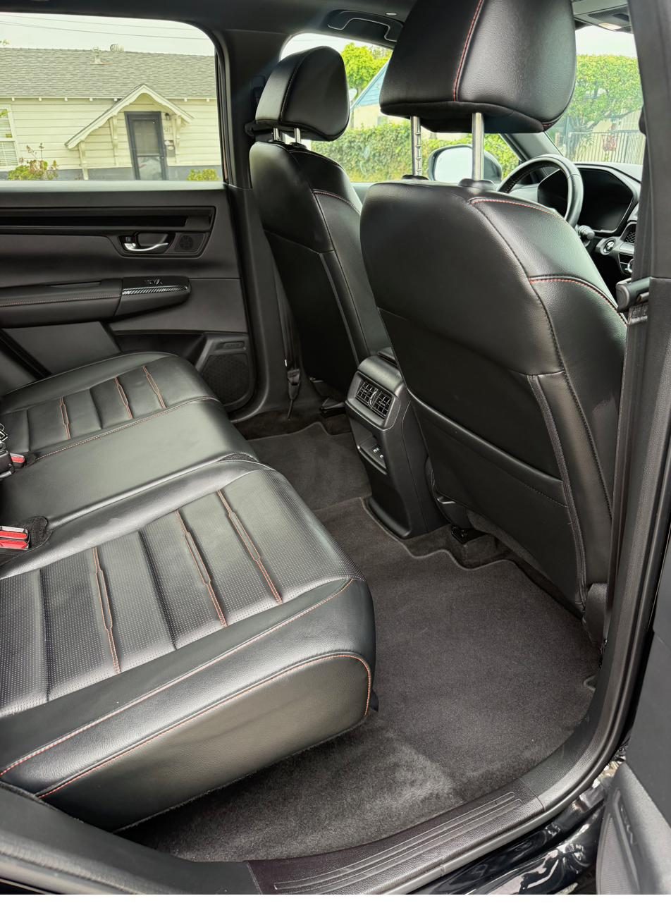 Restored rear cabin with detailed leather seating and vacuumed carpet