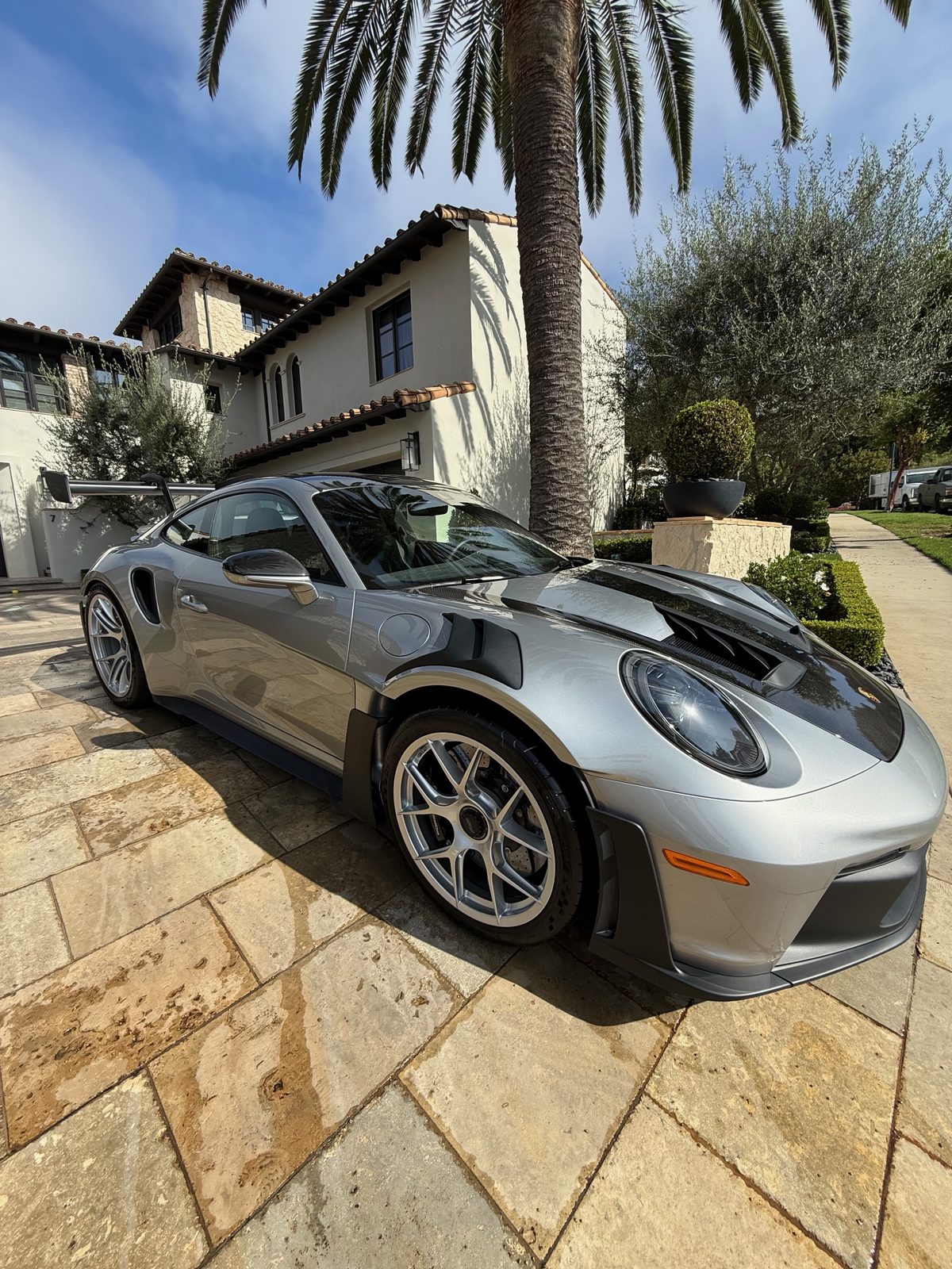 Detailed Porsche 911 coupe on a private driveway